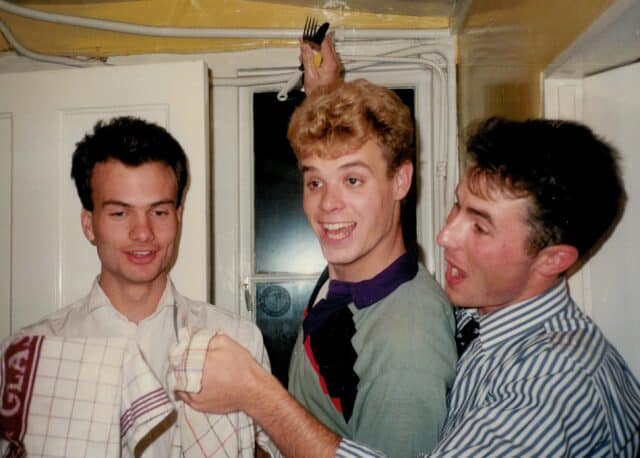 Tim Martin, Jerry Thomas and Matt Whitticase take care of the dishes after Sunday dinner