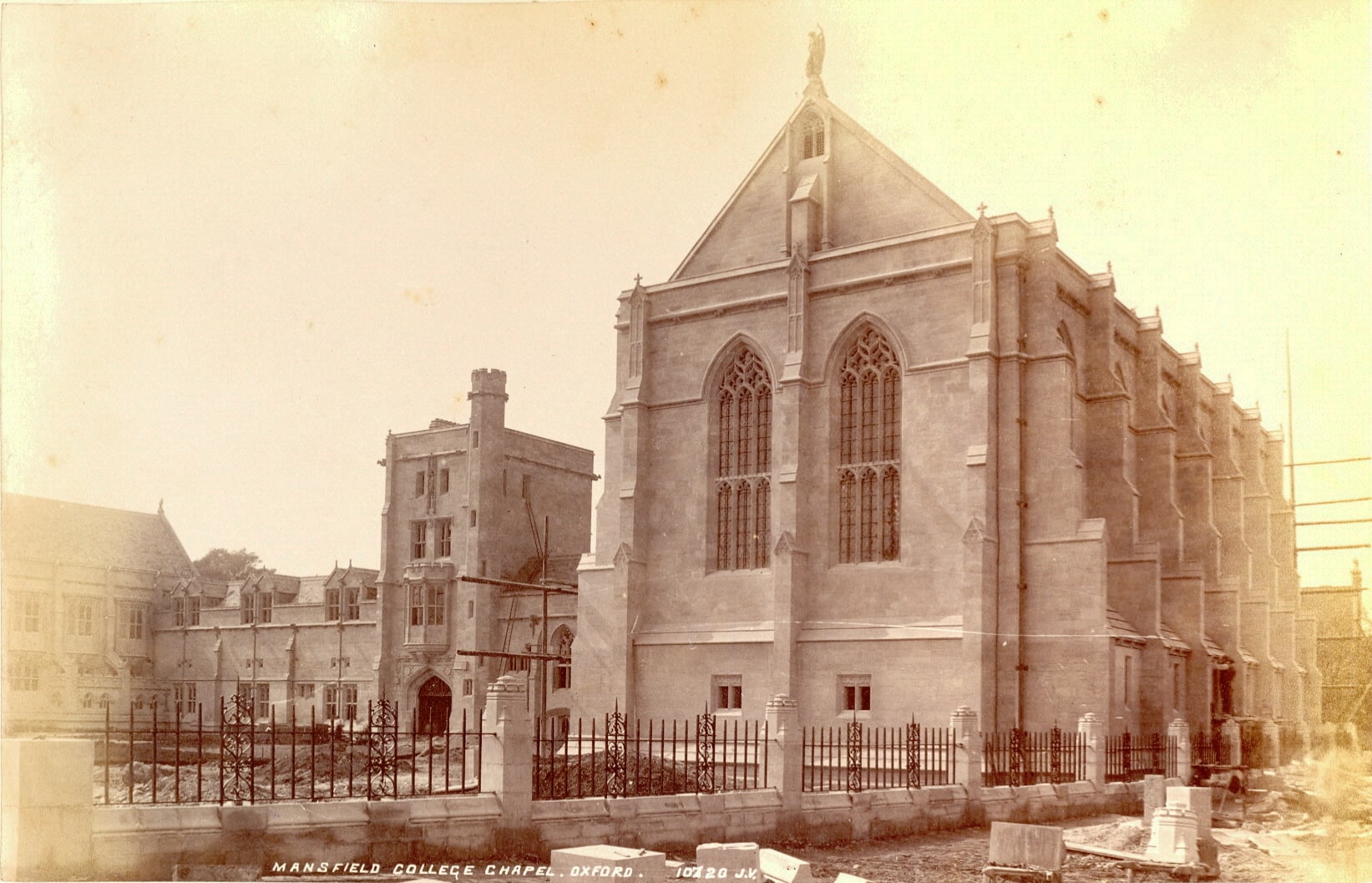 Historical image of the outside of Mansfield College Chapel with building works going on around it.
