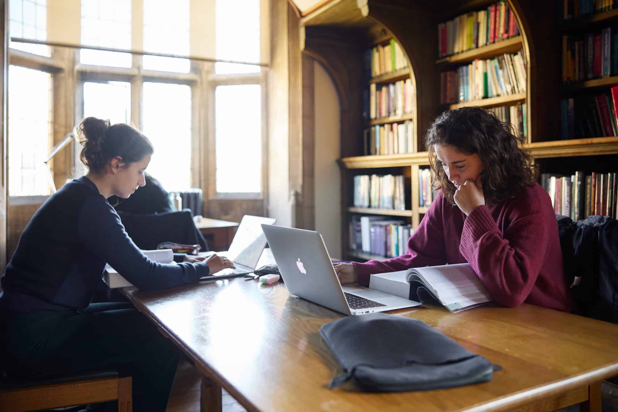 Students studying in the Main College Library.