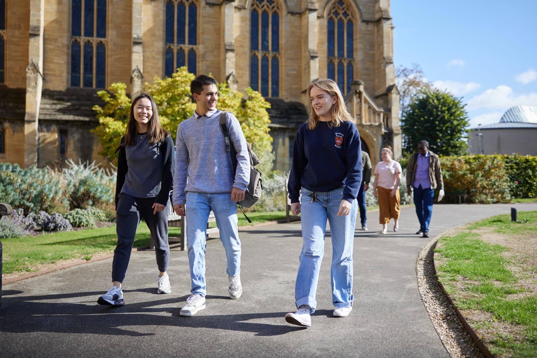 Students walking on College grounds.