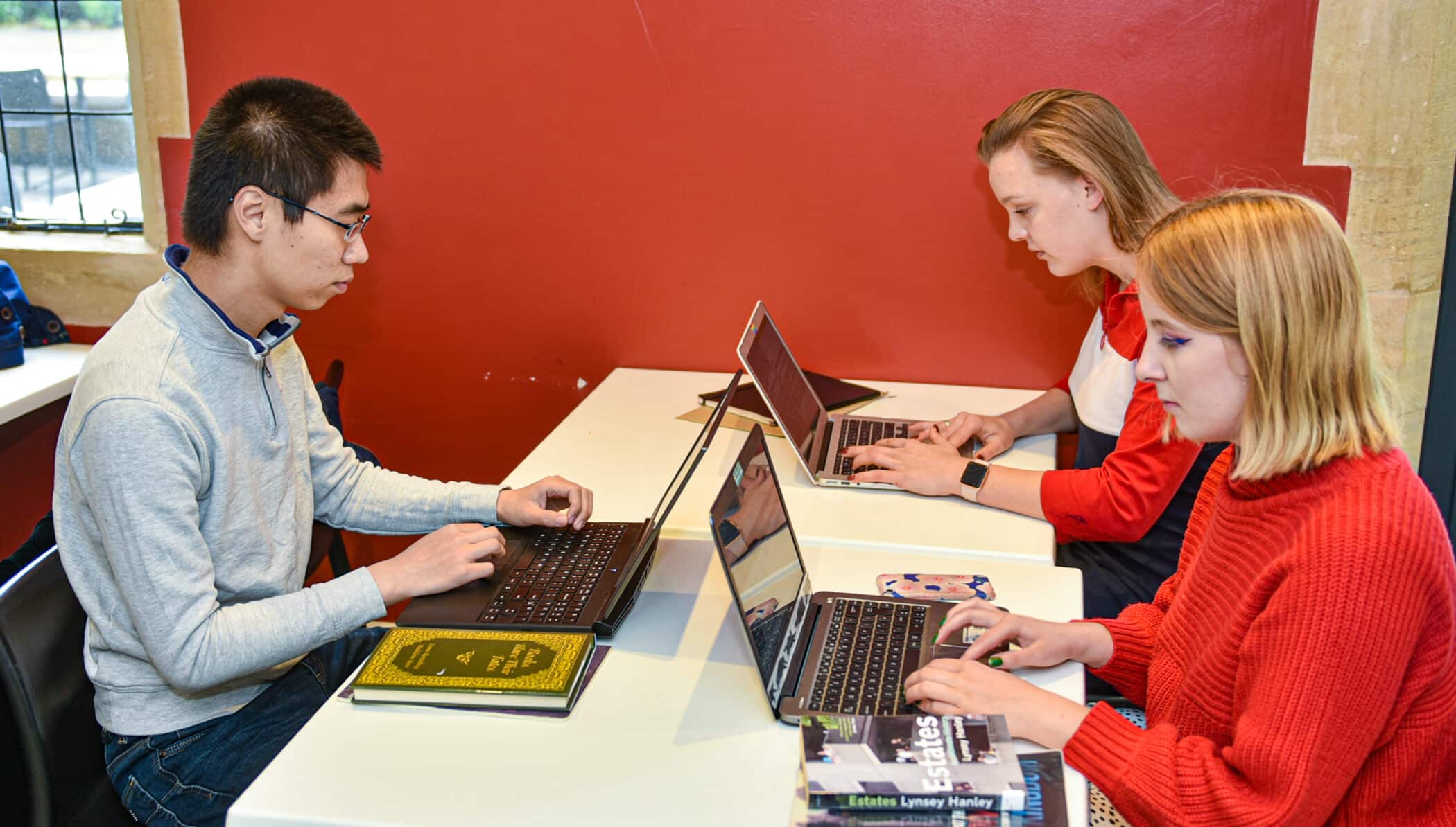 Students studying in the crypt cafe.