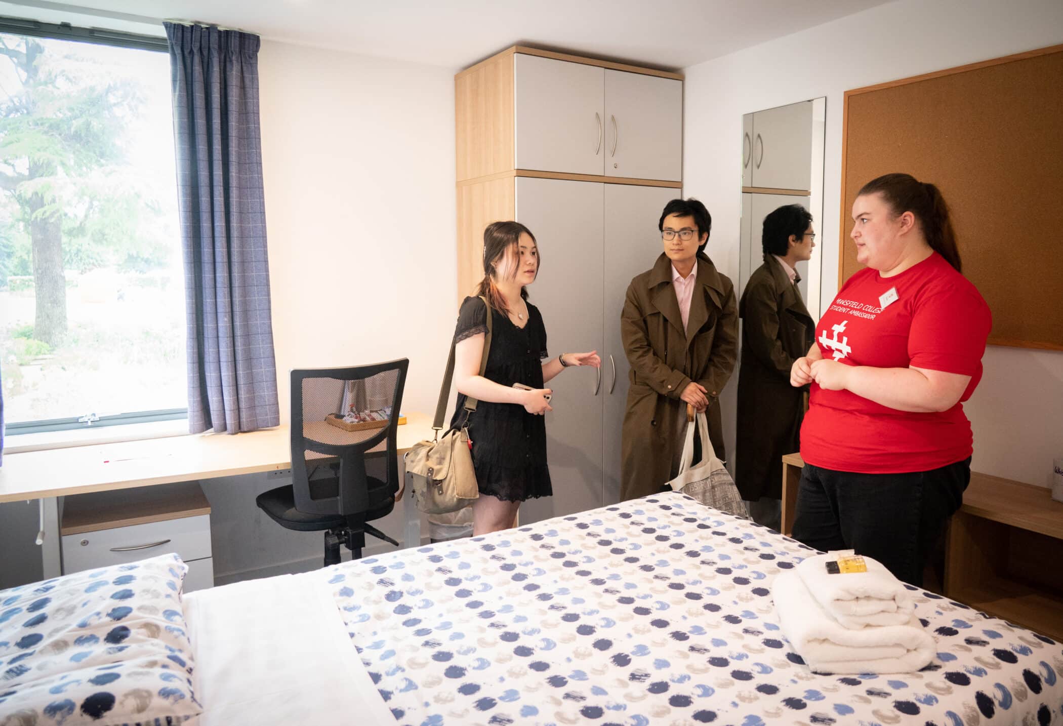 visitors checking out the accommodation with student ambassador