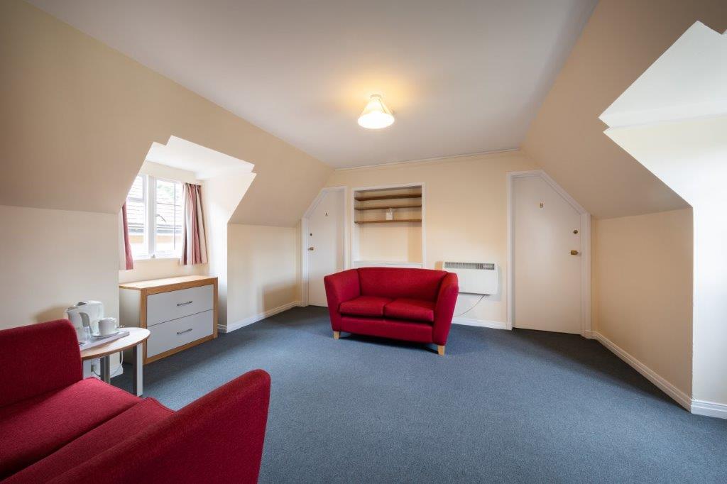 Communal area Principal's Lodgings showing sofas.