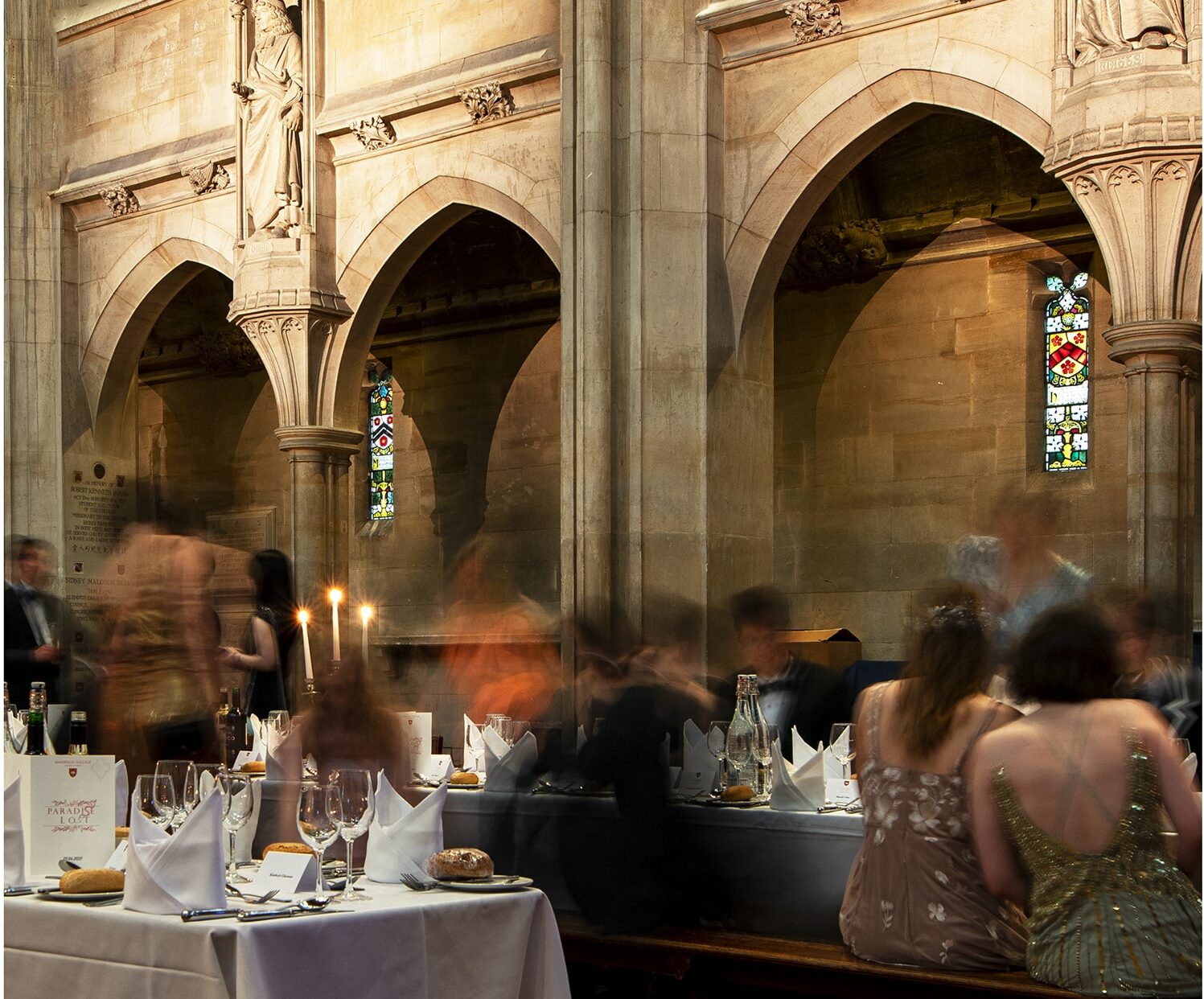 students at Ball dinner in the College Chapel Hall