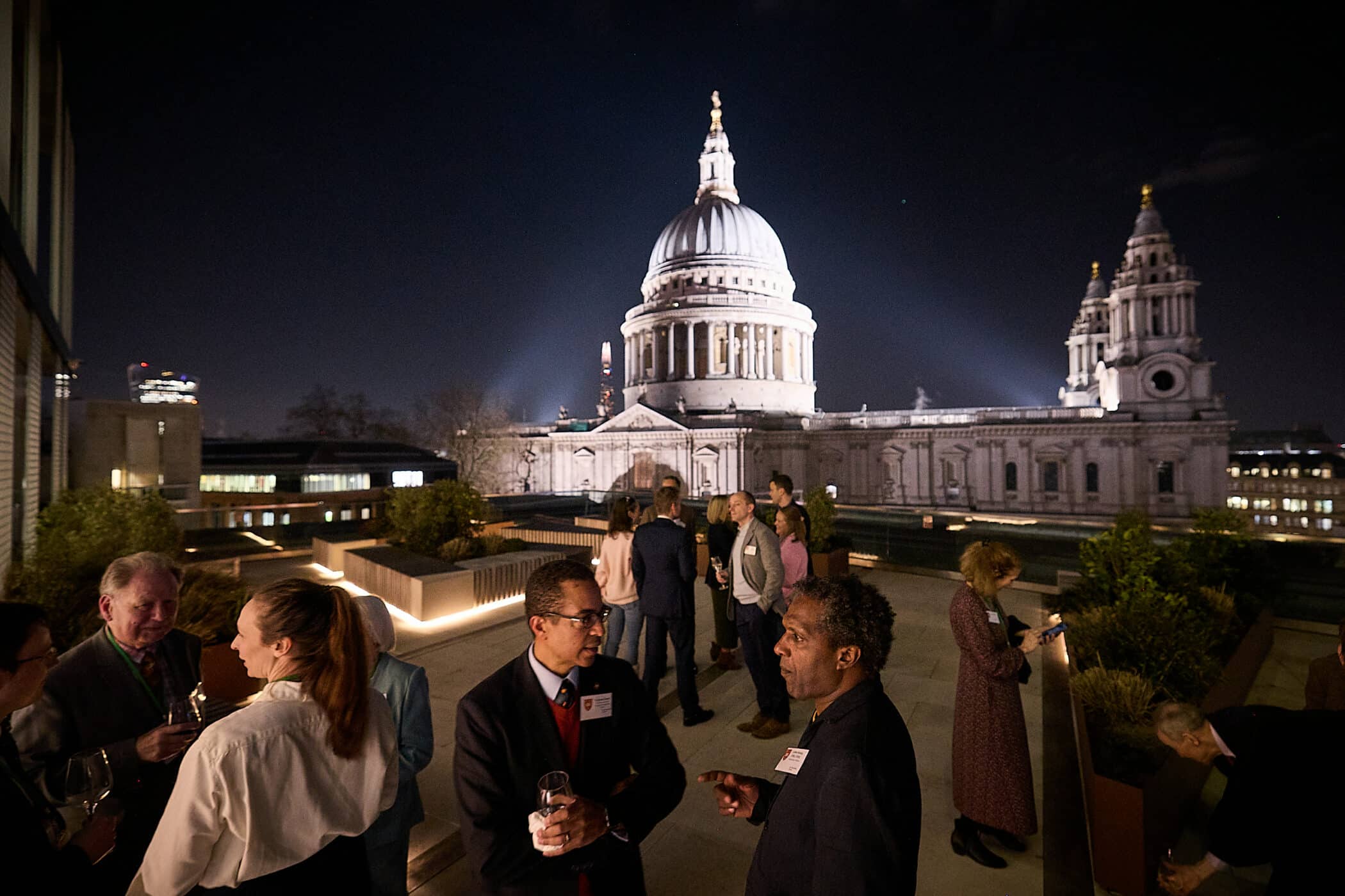 alumni on terrace with St Paul Cathedral in the view