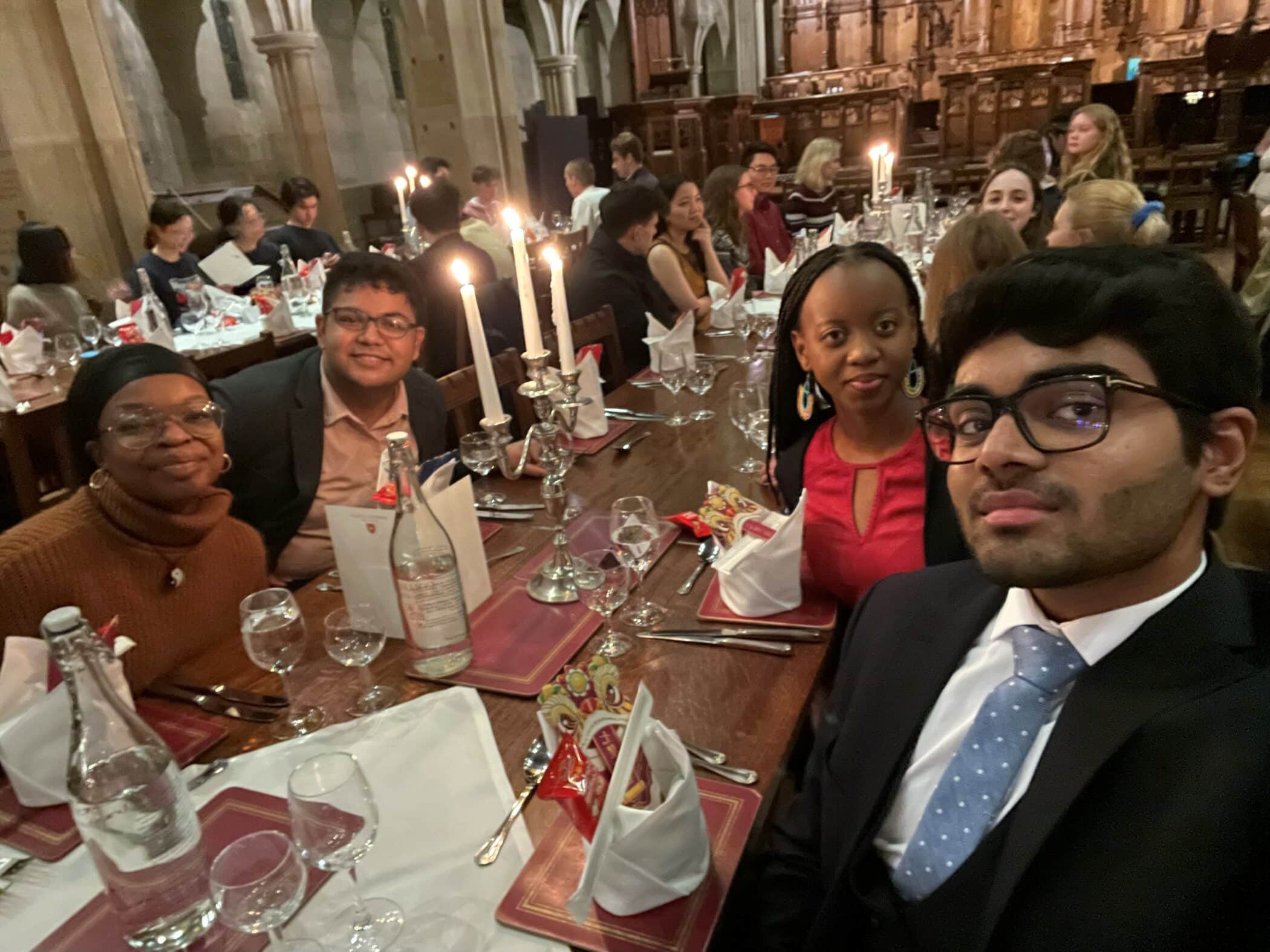 Students posing for photo at Lunar New Years formal dinner in the Chapel.
