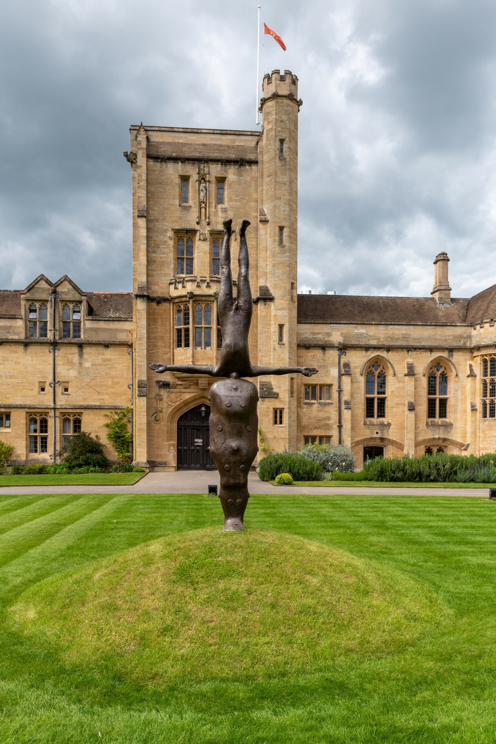 Bronze statue, Present Time by Antony Gormely on Mansfield Quad