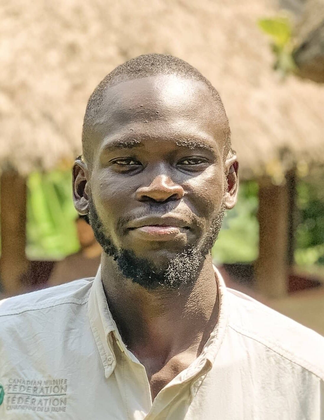 headshot of Aiita Joshua Apamaku