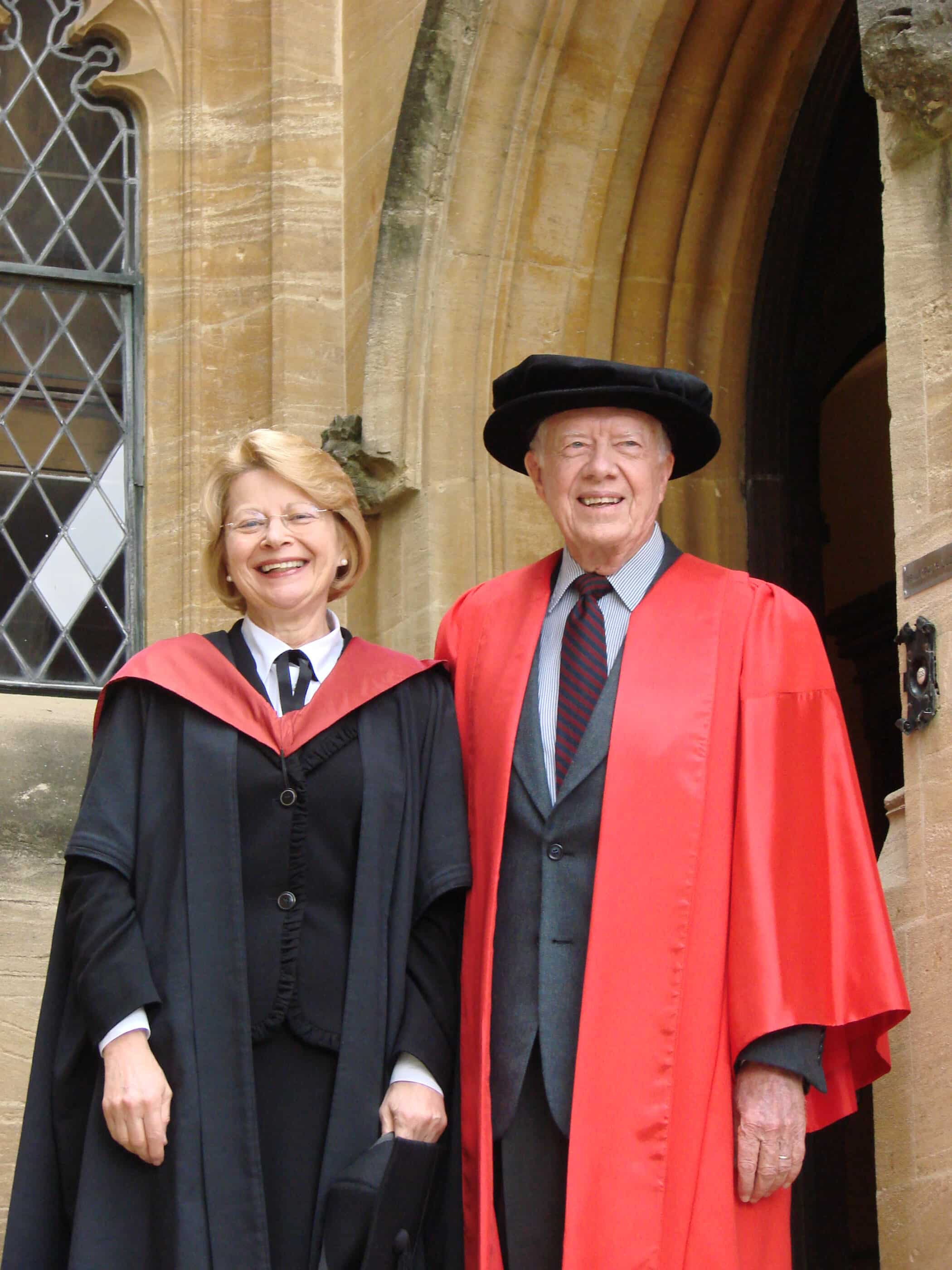 Diana Walford (left) and Jimmy Carter (right) both in academic attire photographed outside the Principal's Lodgings in June 2007